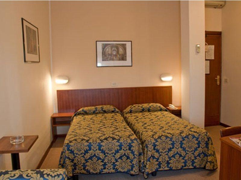 Columbus Urban Resort Firenze Ruang foto A room at the hotel