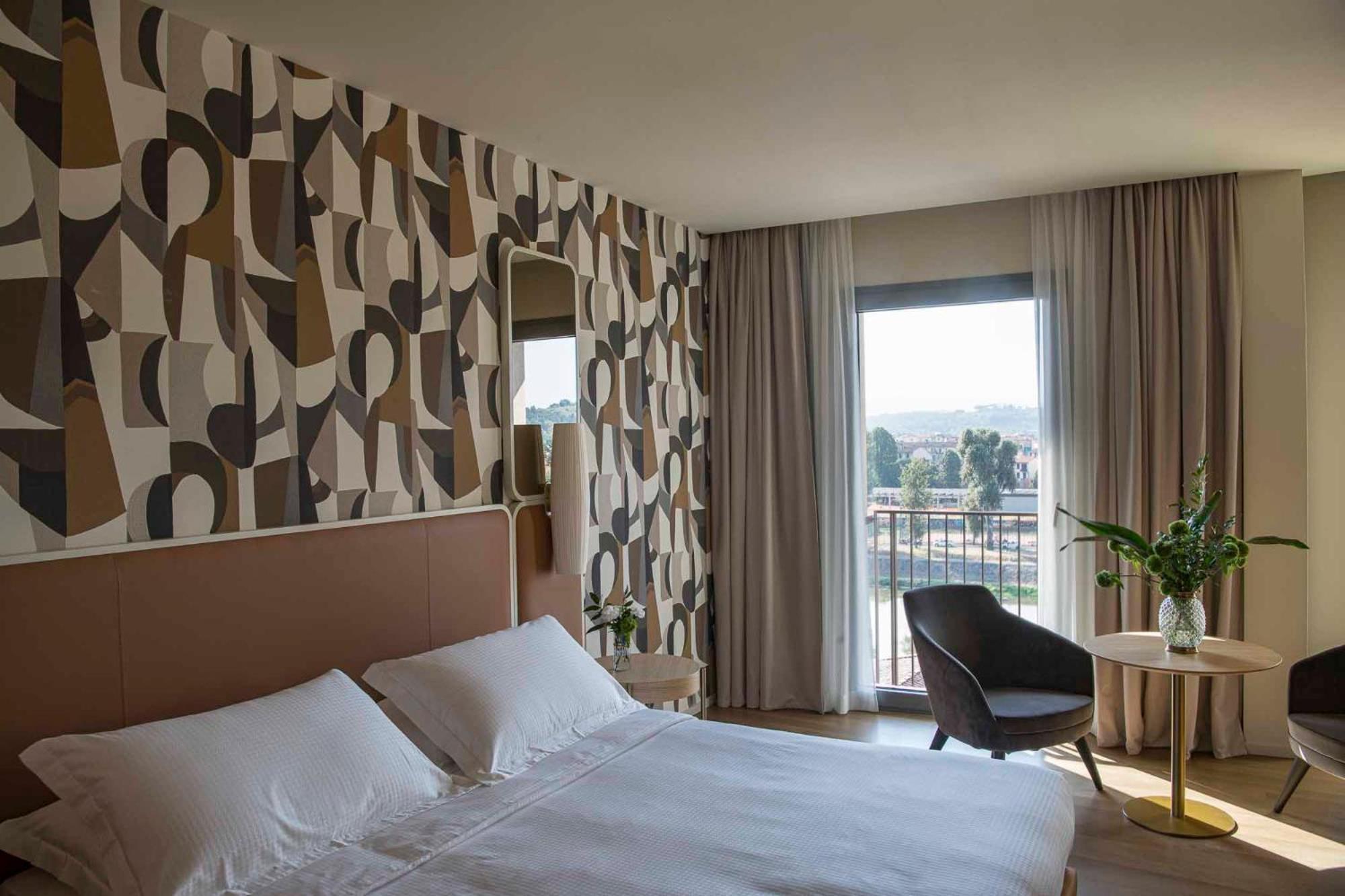 Columbus Urban Resort Firenze Bagian luar foto A room at the hotel