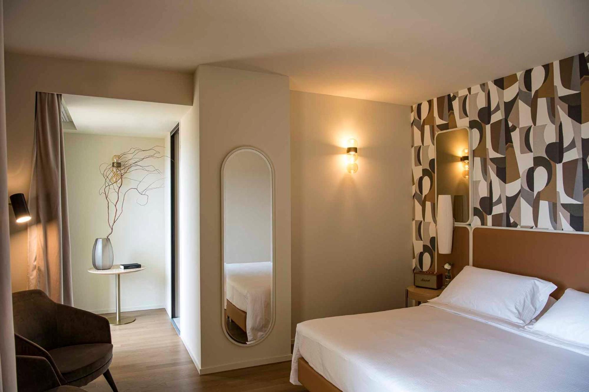 Columbus Urban Resort Firenze Bagian luar foto A room at the hotel